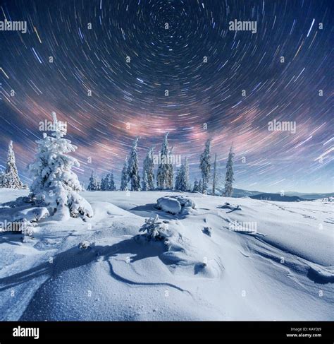 Starry Sky In Winter Snowy Night Fantastic Milky Way In The New Years