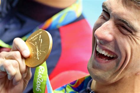 Michael phelps entered the 2004 olympics intent on breaking american swimming phenomenon mark spitz's record of seven gold medals in one olympics. Michael Phelps Has 18 lbs Of Olympic Medals