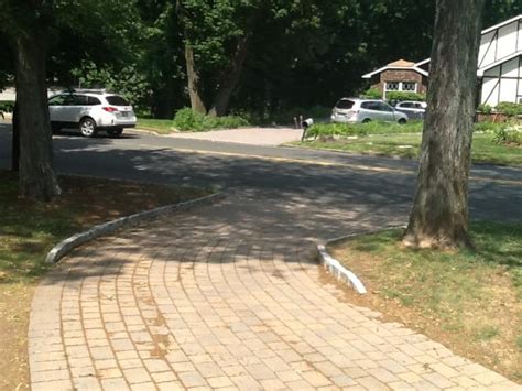Most contractors in my area give free estimates so call around and get if you like, paint it with that black goo every few years to keep it looking nice, and if the driveway cracks and needs replacing, it is cheap and fast to do. Remove Belgian blocks on driveway curb - DoItYourself.com Community Forums