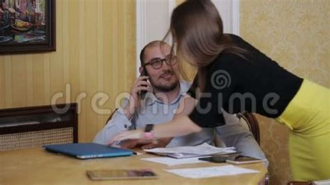 assistant seduces boss in the office the secretary tries to seduce his boss stock footage