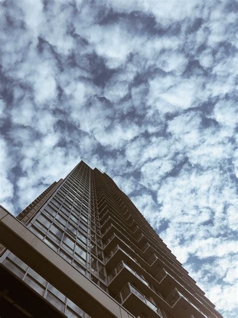 Photo Of A Building And Clouds Riwallpaper