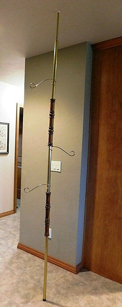 It's traditionally used for hanging curtains, clothes, and room dividers, but it also works for hanging plants. Vntg Mid Century Modern Brass & Wood Tension Pole Plant ...