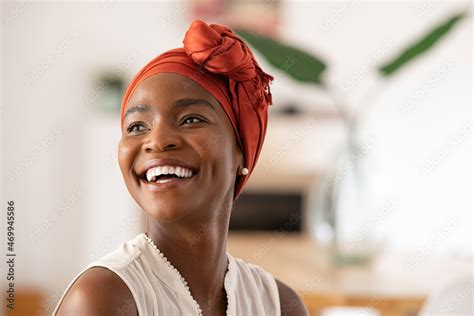 Joyful Mature African Woman Laughing And Looking Away Stock Photo