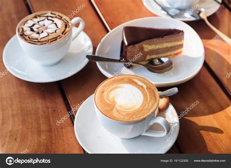 Coffee chocolate mousse cake by selasi gbormittah. Two cups of hot Cappuccino coffee and chocolate mousse ...