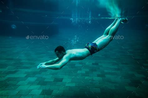 Man Swim Underwater Pool Stock Photo By Avanti Photo PhotoDune