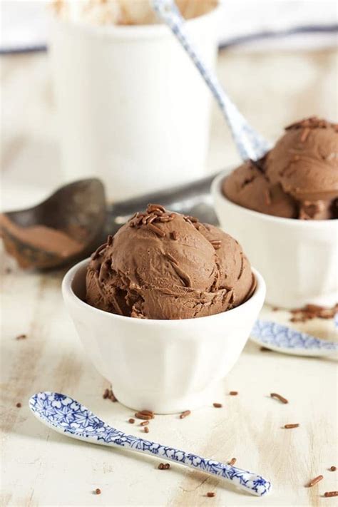 Two White Bowls Filled With Chocolate Ice Cream