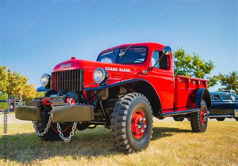 Front Side View Of A Red Vintage 1948 Dodge Power Wagon Classic Truck