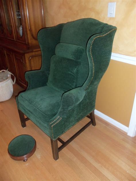 This silhouette comes with a nail head trim that embellishes the flared outline while the emerald green velvet magnetizes the. Wingback Chair Forest Green with Matching Footstool ...