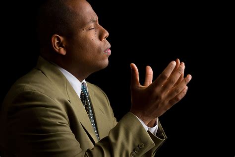African American Man Praying Easter Hill United Methodist Church