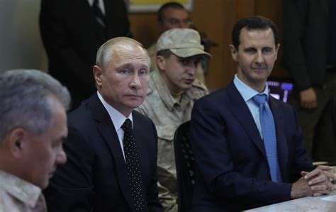 Vladimir Putin In Syria To Declare Victory Hug Bashar Assad And Announce Partial Russia Troops