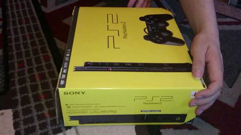 Nostalgamer Unboxes Pal Playstation 2 Slimline System Yellow Box