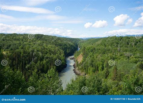 A River Winding Through The Wilderness In The Springtime Stock Photo