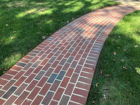 A New Serpentine Paver Walkway Fits Right Into Established Neighborhood