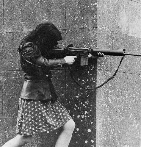Ira Fighter Fires An Ar 18 At Pro British Troops During Skirmishes In County Armin Northern