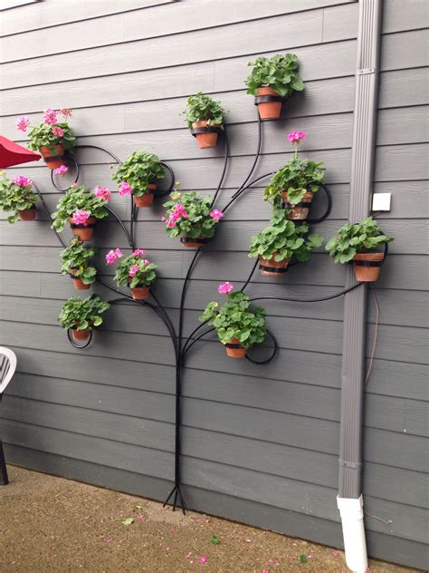 Simple but super effective this concept is great for small, urban courtyard gardens such as this london garden by silva landscapes. On the wall at Ellicottville Brewery | Diy planters ...