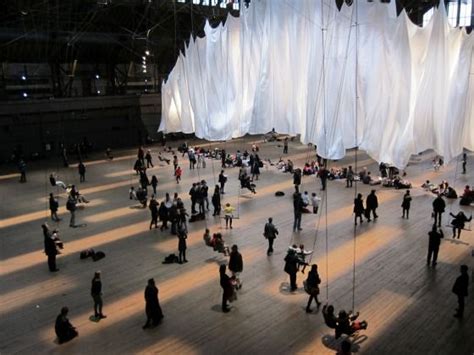 Large White Curtains Hang From The Ceiling Of The Park