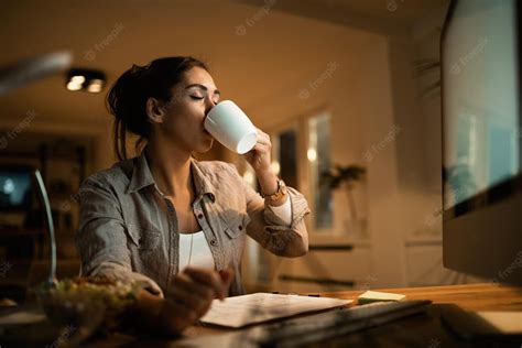 Free Photo Young Woman Drinking Coffee With Eyes Closed While