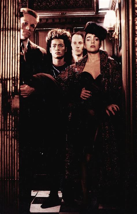 fright night 2 the gang going up the elevator regine is in a sleek dress with a metallic