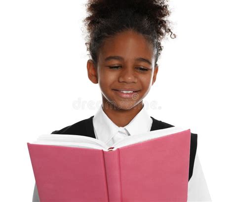 Happy African American Girl In School Uniform Reading Book Stock Photo