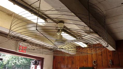 Ceiling fans provide coolness on warm days. Big barn fan - YouTube