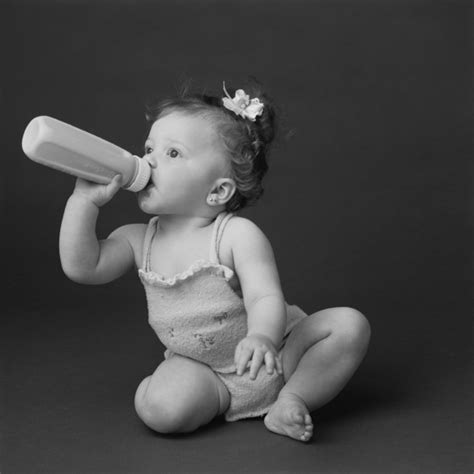 Baby Girl Drinking Milk From Bottle Close Up Free Photo Download