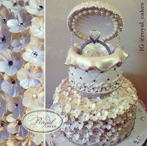 Nowadays, individuals are hosting a grand party at their engagement in which many guests are invited. Harsanik - Engagement Ring Box Cake By Royal Cakes