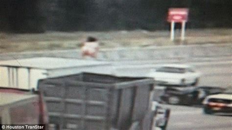 Woman Brings Houston Highway Traffic To A Stop By Dancing Naked On Big Rig S Roof Daily Mail