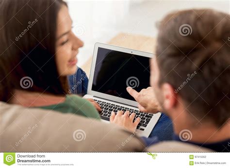 Watching Something On A Laptop Stock Photo Image Of Boyfriends