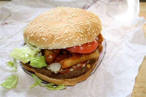 If you refer to something as a whopper, you mean that it is an unusually large example of the thing mentioned. An Immovable Feast: Burger King Angry Whopper: Still (Not ...
