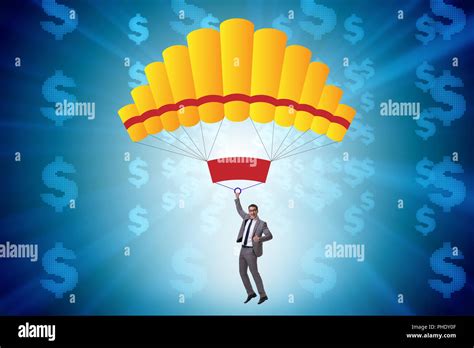 Businessman In Golden Parachute Concept Stock Photo Alamy
