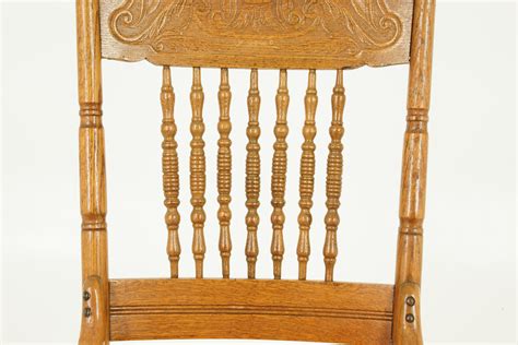 Antique Rocking Chair Spindle Pressed Back Carved Oak America 1910