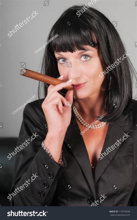 Стоковая фотография 119570038 Sexy Beautiful Business Woman Smoking