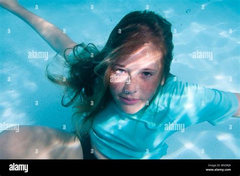 Girl Holding Breath Under Water Stock Photo Alamy