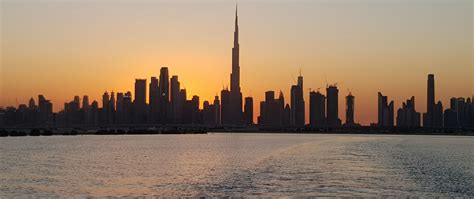 Download Wallpaper 2560x1080 Coast Buildings Sunset City Dubai Uae
