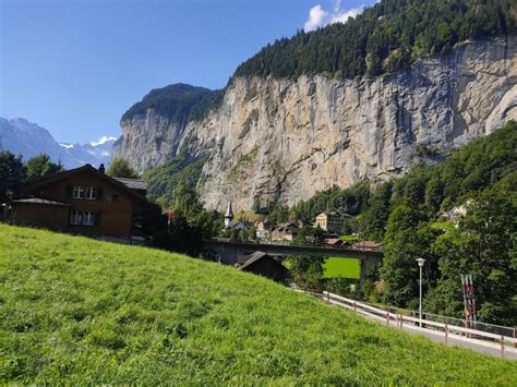 Lauterbrunnen A Picturesque Village With Its Log Cabins Between Two