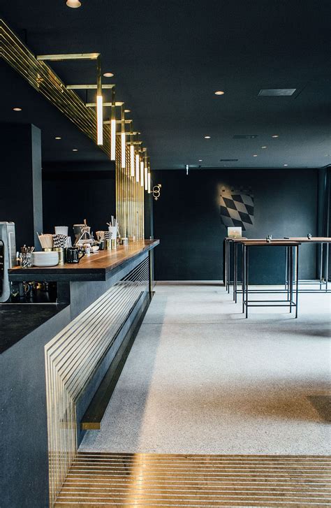 Midcentury Timeless Touches Dramatically Frame The Modern Bar In Munich