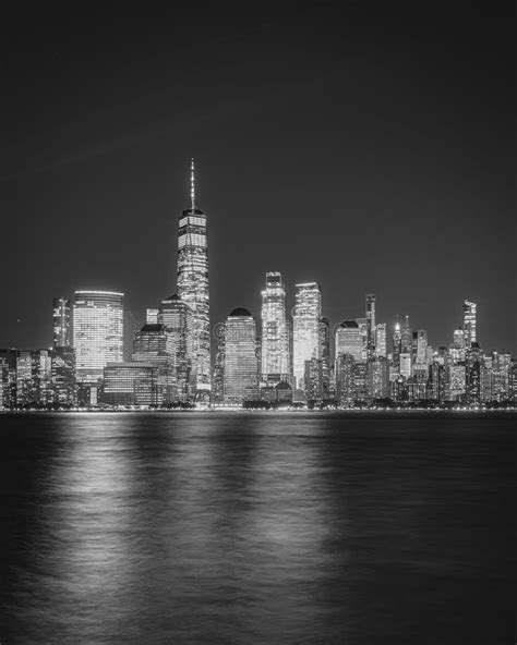 View Of The Lower Manhattan Skyline At Night From Jersey City New