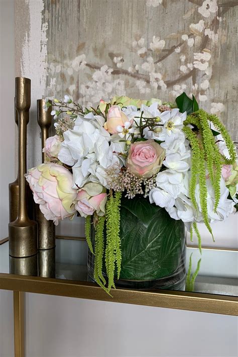 Roses Hydrangeas And Amaranthus In A Leaf Lined Cylinder Rtfact Flowers