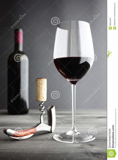Wine Glass Of Red Wine Corkscrew And Bottle Stock Photo Image Of