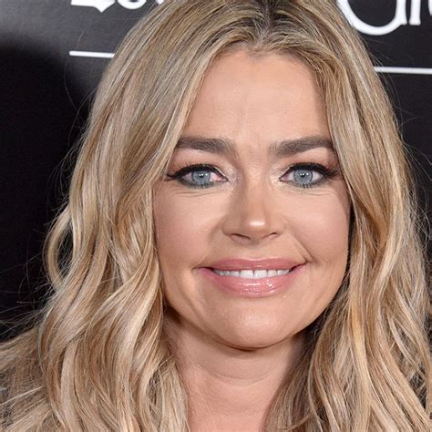 Denise Richards Wows In Figure Hugging Blue Swimsuit In Latest Poolside
