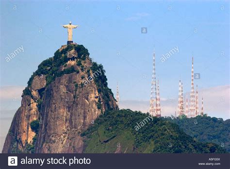 Christ Statue In Rio De Janeiro Brazil Contrasts With