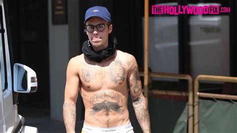 Justin Bieber Shows Off His Tattoos With No Shirt And Talks To Paparazzi