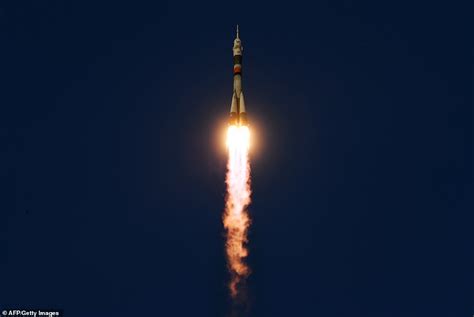 space station crew to inspect mysterious hole on soyuz spacecraft daily mail online