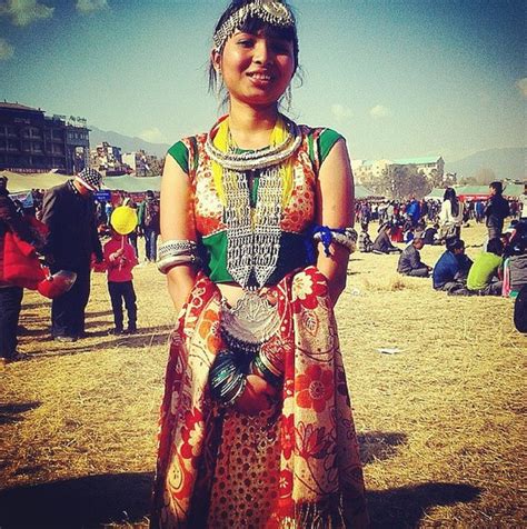 Festive Tharu Attire As The Nepalese Celebrate The Convergence Of Maghe Sankranti And The Tharu