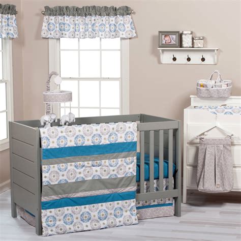 This set includes a crib quilt, two valances, skirt, sheet, bumpers, diaper stacker, toy bag, two throw pillows and three wall hangings. Trend Lab Monaco 3-Piece Crib Bedding Set - Walmart.com ...