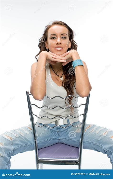 The Beautiful Brunette Posing With A Chair Stock Image Image Of Cool