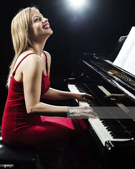 Beautiful Woman Playing The Piano High Res Stock Photo Getty Images