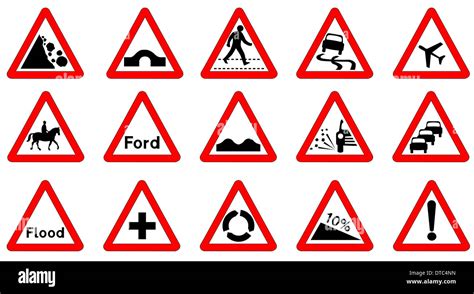 A Collection Of Triangle Traffic Signs Isolated On White Stock Photo