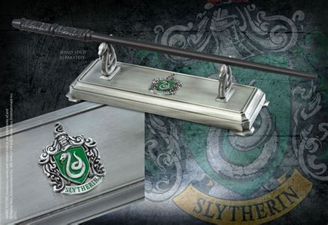 In this case, a basilisk. Slytherin Wand Stand at noblecollection.com