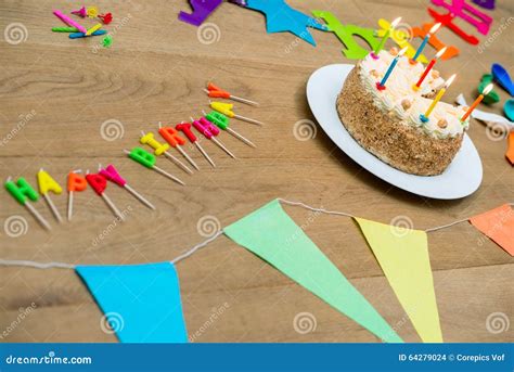Birthday Cake And Decorations On Table Stock Photo Image Of